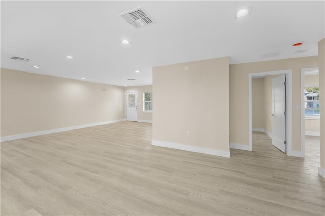 2418 Whitehall Cir, Winter Park, FL 32792 - spare room featuring baseboards, visible vents, and light wood finished floors