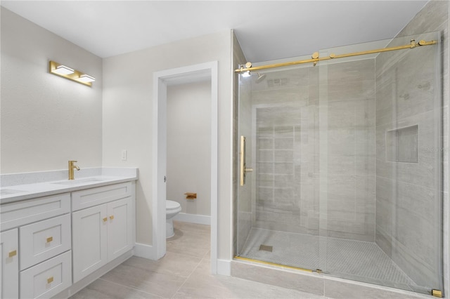 2418 Whitehall Cir, Winter Park, FL 32792 - bathroom with a shower stall, toilet, tile patterned flooring, and a sink