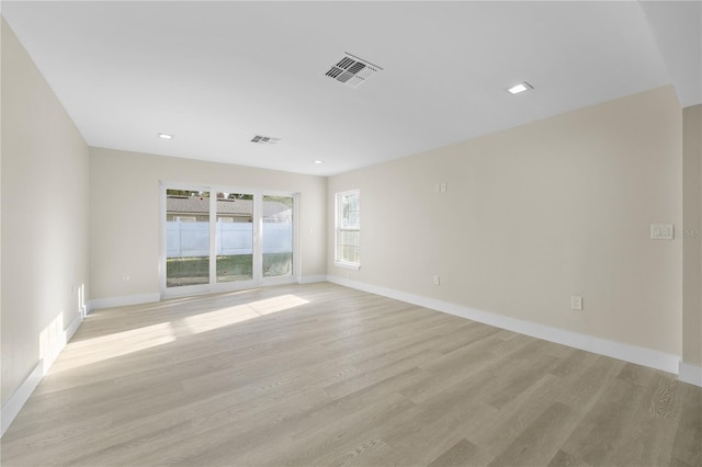 2418 Whitehall Cir, Winter Park, FL 32792 - empty room featuring baseboards, visible vents, and light wood-style floors