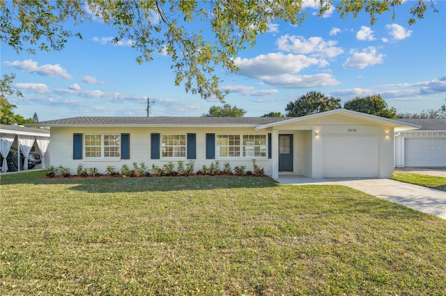 2418 Whitehall Cir, Winter Park, FL 32792 - ranch-style house with concrete driveway, a garage, and a front lawn
