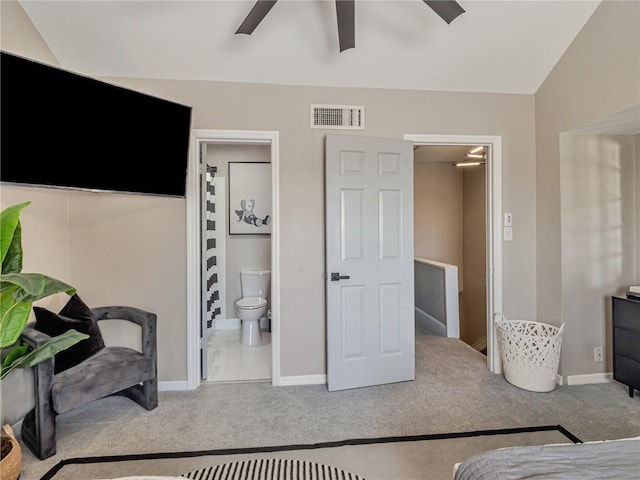 1174 Villa Ln Unit 115, Apopka, FL 32712 - carpeted bedroom with ensuite bathroom and a ceiling fan