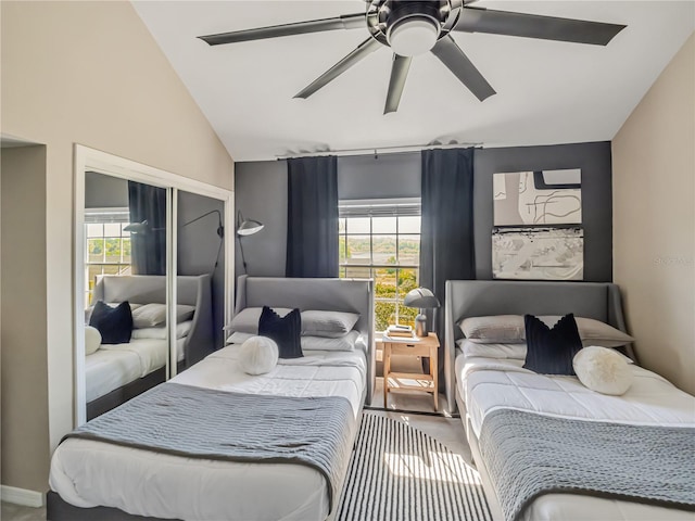 1174 Villa Ln Unit 115, Apopka, FL 32712 - carpeted bedroom featuring vaulted ceiling, multiple windows, a ceiling fan, and a closet