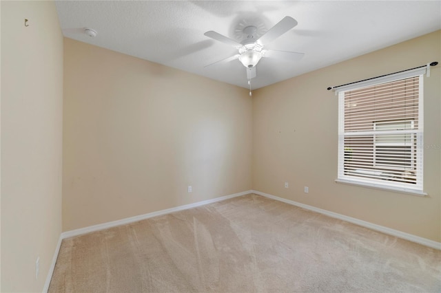 3823 Ryegrass St, Clermont, FL 34714 - empty room with a ceiling fan, baseboards, and light colored carpet