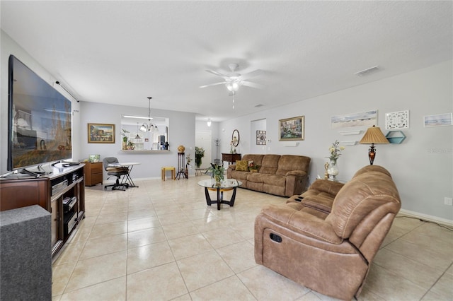 3823 Ryegrass St, Clermont, FL 34714 - living area with a ceiling fan, baseboards, and light tile patterned floors