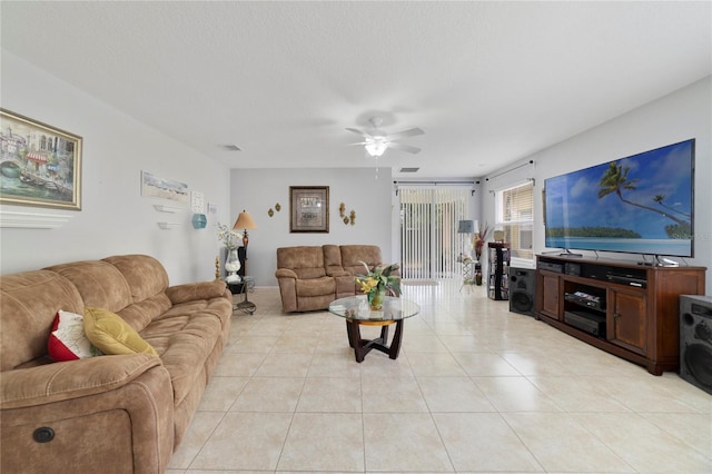 3823 Ryegrass St, Clermont, FL 34714 - living room featuring visible vents, a ceiling fan, and light tile patterned floors