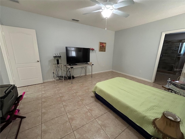3823 Ryegrass St, Clermont, FL 34714 - bedroom with tile patterned floors, baseboards, a ceiling fan, and visible vents