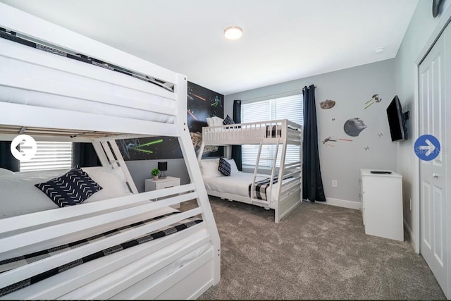 bedroom featuring a closet and carpet flooring