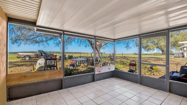 sunroom / solarium featuring wooden ceiling