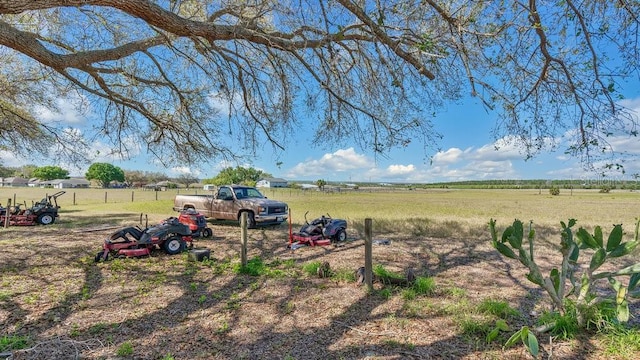 view of yard with a rural view