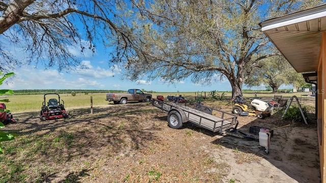 view of yard with a rural view