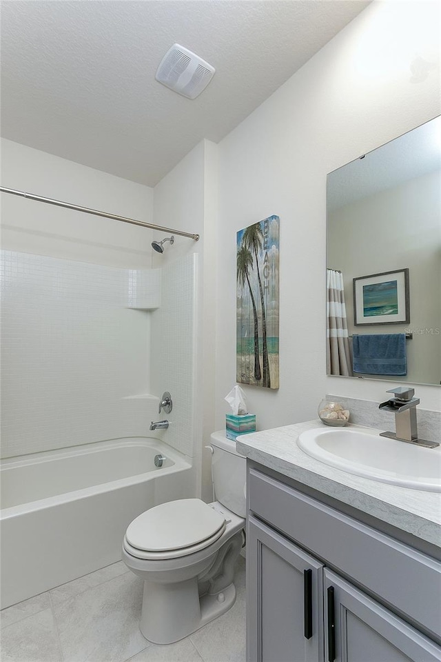 full bath with visible vents, toilet, shower / bath combo, tile patterned floors, and vanity