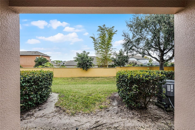 view of yard featuring fence