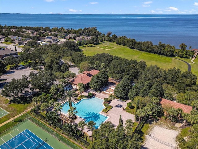 birds eye view of property with a water view