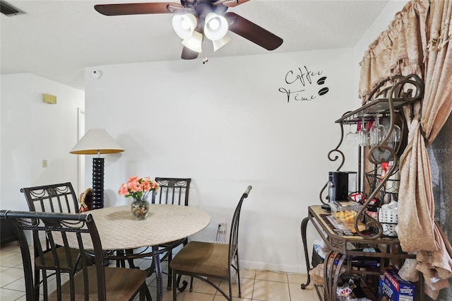 dining room with visible vents, baseboards, and light tile patterned flooring