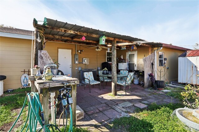 back of house featuring a patio