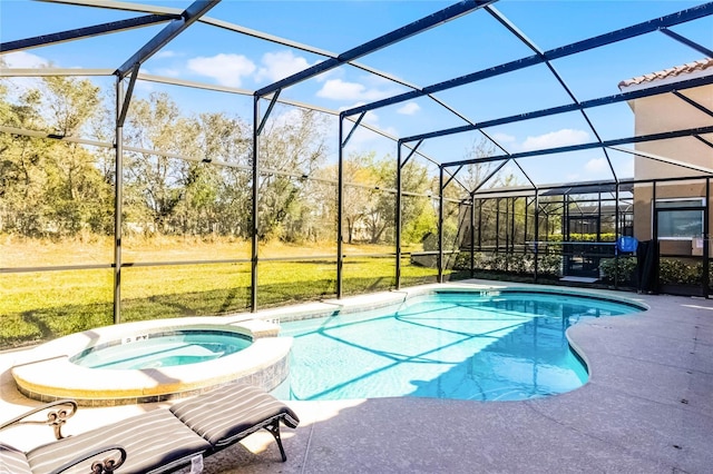 view of pool featuring glass enclosure, a patio, a pool with connected hot tub, and a yard