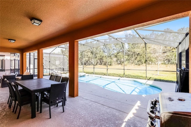 outdoor pool featuring a patio and a lanai