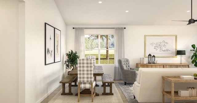living area with recessed lighting, baseboards, and light wood-style floors