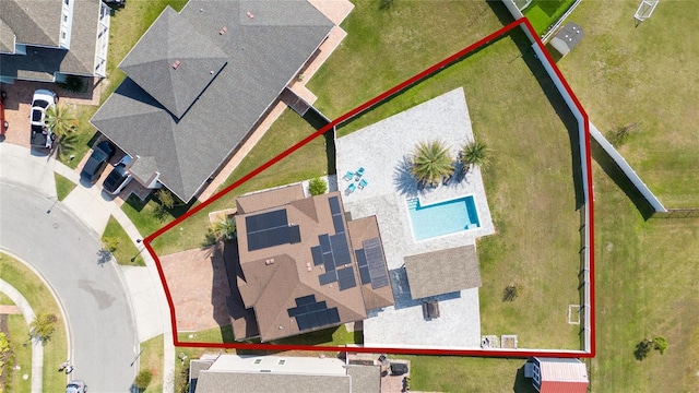 birds eye view of property with a residential view