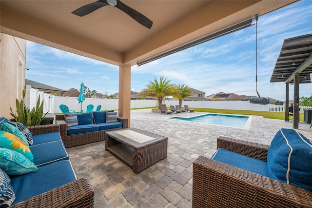 view of patio with a ceiling fan, a fenced backyard, a fenced in pool, and an outdoor hangout area