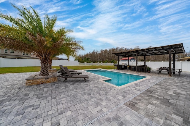 view of pool featuring a patio, a fenced in pool, a fenced backyard, and a pergola