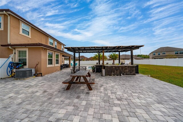 view of patio / terrace with central AC unit, a fenced backyard, and a pergola