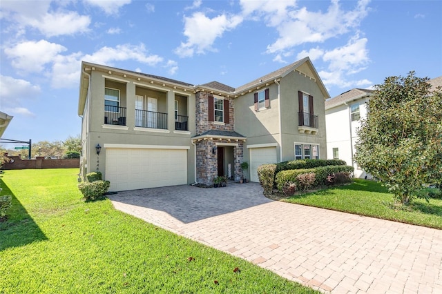 view of front facade featuring stucco siding, a front lawn, decorative driveway, an attached garage, and a balcony