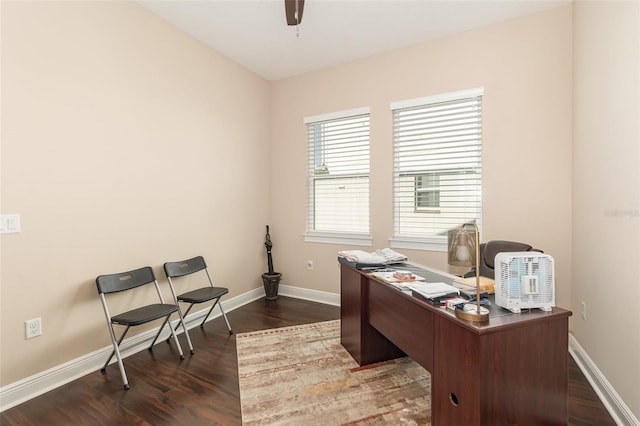 office with baseboards, dark wood-style floors, and a ceiling fan