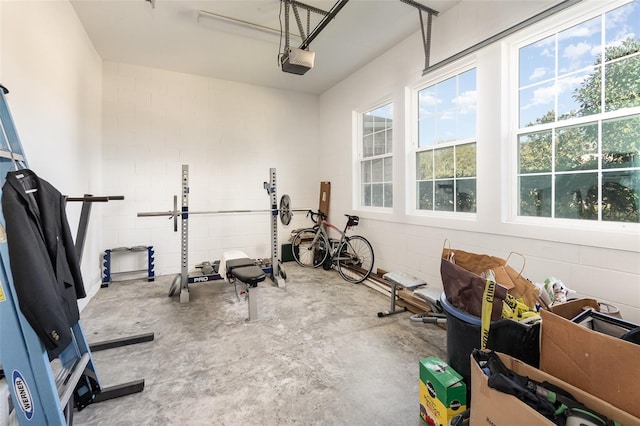 exercise area with concrete block wall