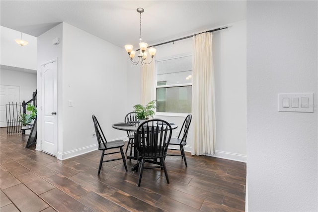 dining area with stairway, dark wood-style floors, baseboards, and a chandelier