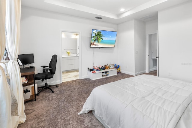 bedroom with visible vents, baseboards, a tray ceiling, recessed lighting, and carpet flooring