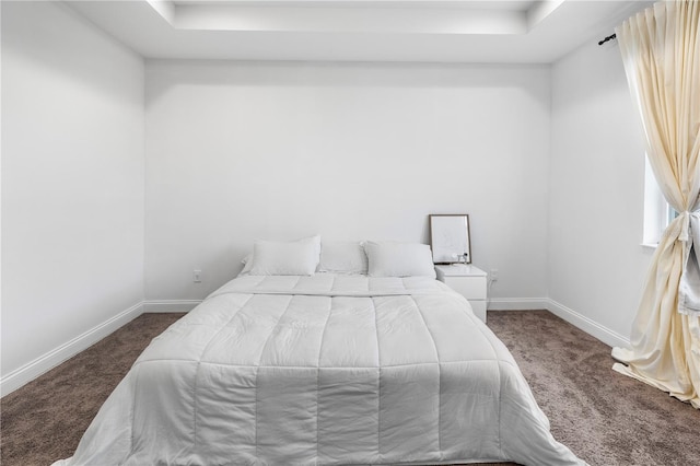 carpeted bedroom with baseboards