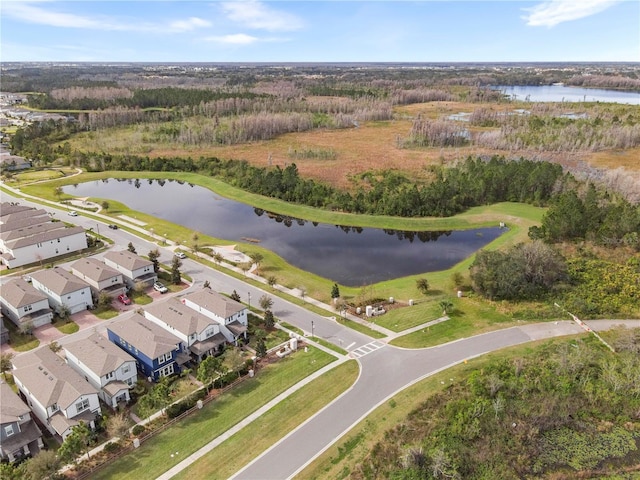 birds eye view of property featuring a residential view and a water view