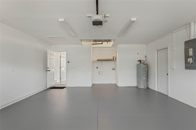 garage featuring electric water heater and a garage door opener