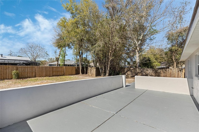 view of patio featuring a fenced backyard