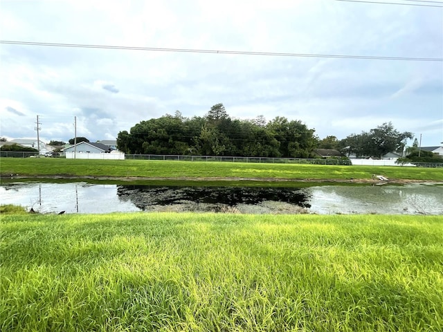 water view featuring fence