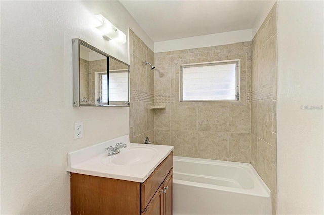 full bathroom with shower / washtub combination and vanity