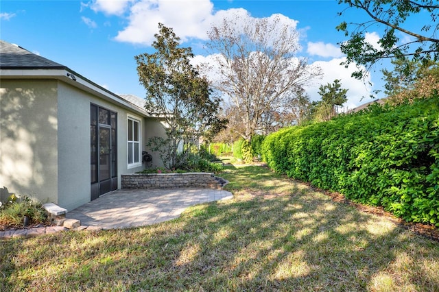 view of yard with a patio area