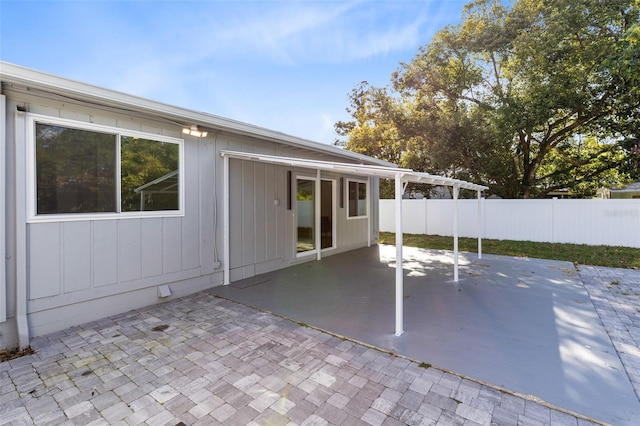 view of patio / terrace featuring fence