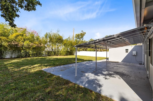 view of yard featuring a patio and a fenced backyard