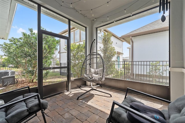 sunroom featuring plenty of natural light