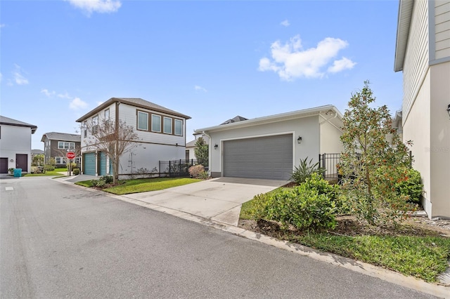 view of front of house featuring a garage and stucco siding