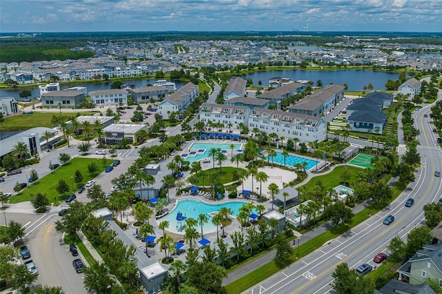 aerial view featuring a residential view and a water view