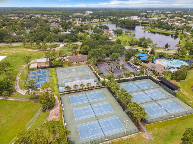 birds eye view of property featuring a water view