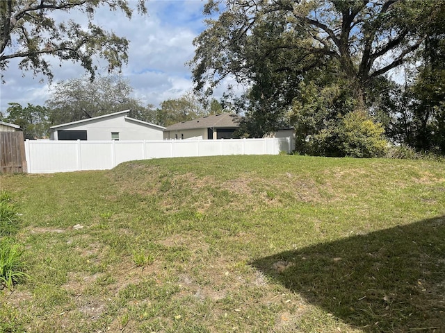 view of yard featuring fence