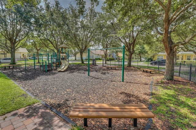 community playground featuring fence