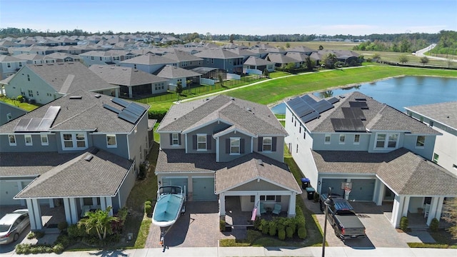 aerial view with a residential view and a water view