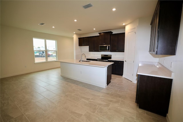 kitchen featuring visible vents, recessed lighting, stainless steel appliances, and light countertops