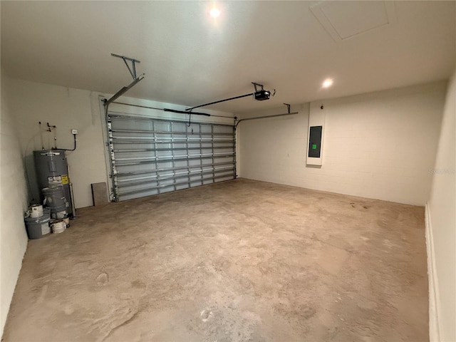 garage with electric panel, a garage door opener, and water heater