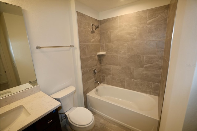 bathroom featuring toilet, vanity, and shower / bathtub combination